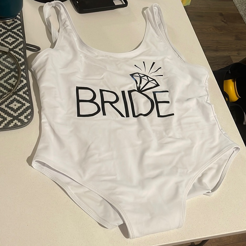 Bride bathing suit. Ordered 3x, I would say this fits as a 1x.